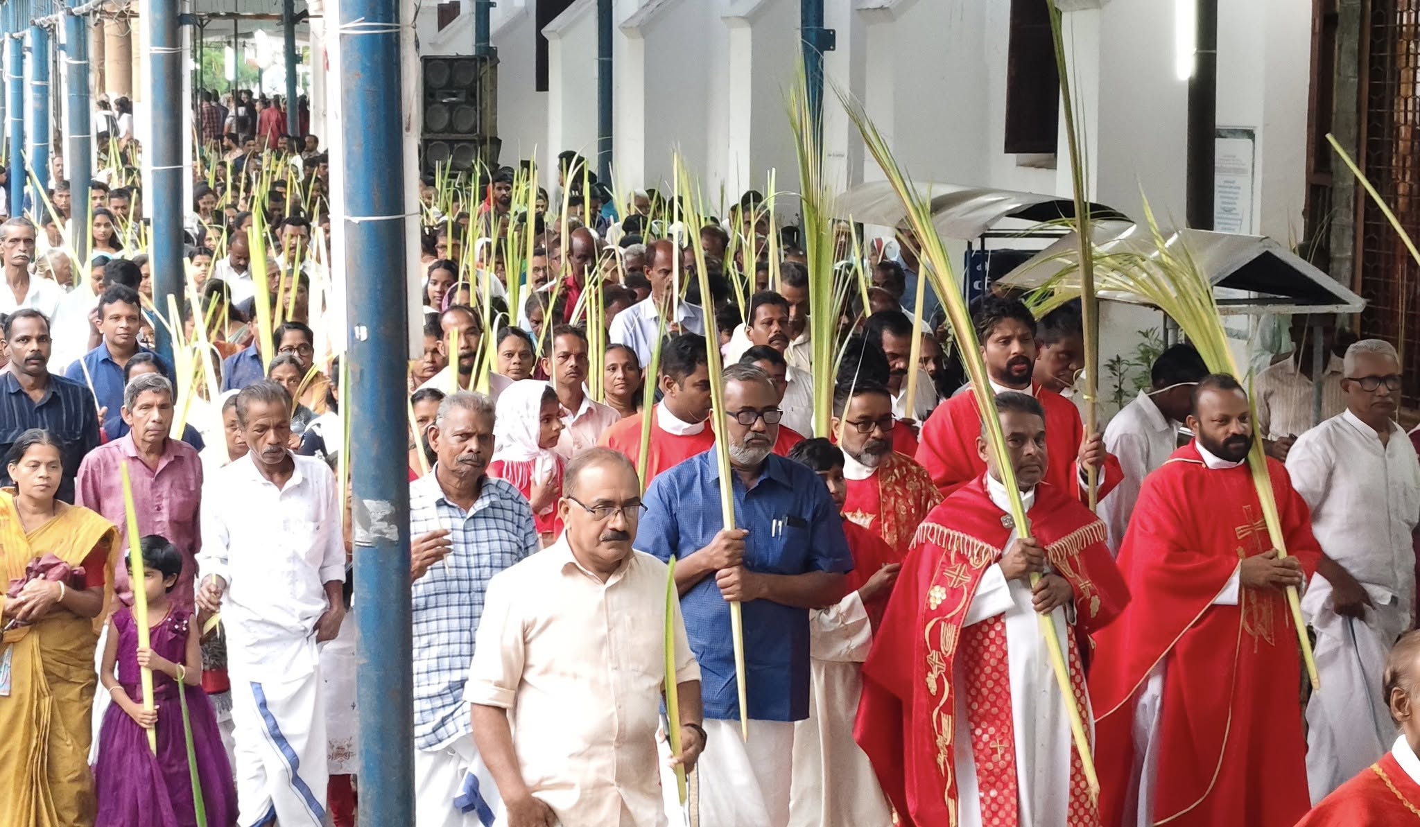 Palm Sunday at Thankey Church — pilgrims with palm fronds
